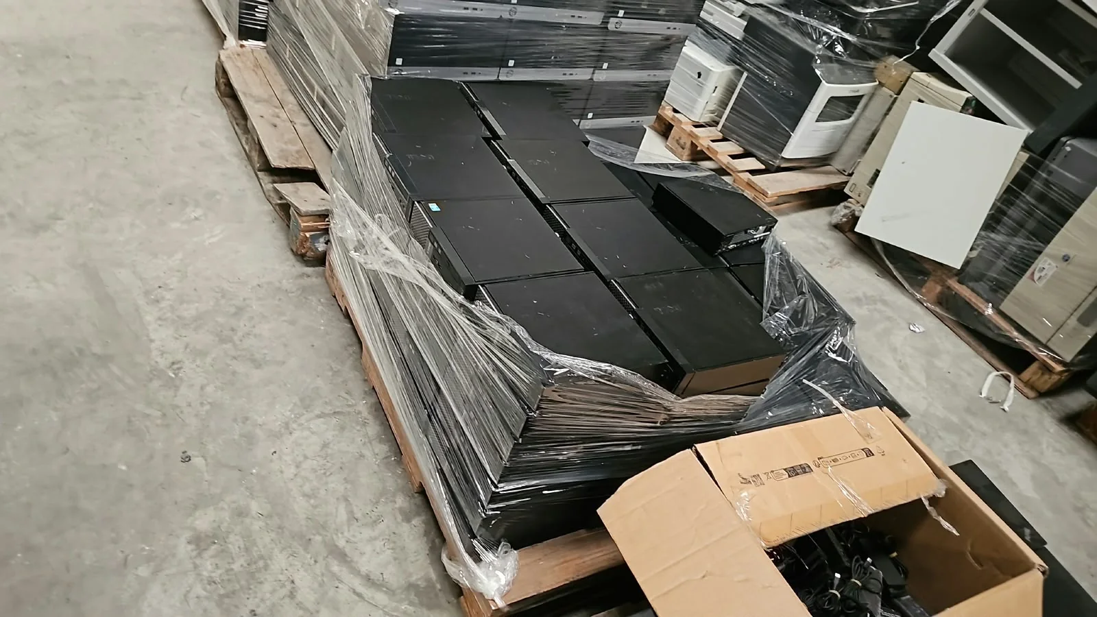 Pallet of used Dell OptiPlex small form factor desktop PCs